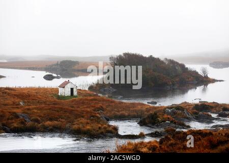 Cute little white house on the coast, Connemara, Co. Galway, Ireland, Europe Stock Photo