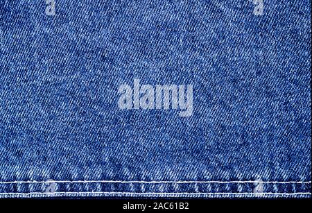 Blue jeans texture denim background pattern . Women and Men fashion accessory . Stock Photo