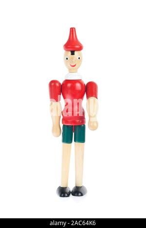 Wooden Pinocchio doll cutout Stock Photo