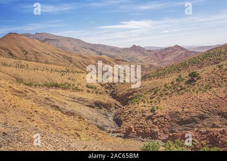 Dried out river bed in the mountains on the Tizi n'Tichka pass on road 9 from Marrakech to Ouarzazate Stock Photo