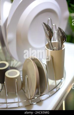 washed dishes on the kitchen table Stock Photo