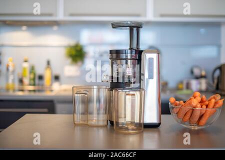 Juicer And Apple Juice. Preparing Healthy Fresh Juices. Home Juicing Apples  In The Kitchen. Processing Autumnal Fruit. Stock Photo, Picture and Royalty  Free Image. Image 65249557.