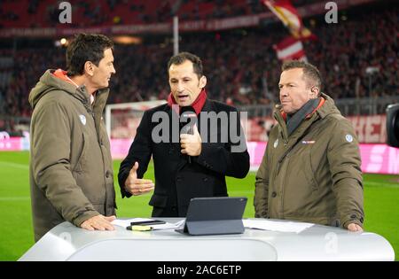 Munich, Germany. 30th Nov 2019. Football FC Bayern Munich - Leverkusen, Munich November 30, 2019.  Hasan ( Brazzo ) Salihamidzic, FCB Sport director Lothar Matthaeus Sebastian HELLMANN, Sky Moderator  presenter  FC BAYERN MUNICH - BAYER 04 LEVERKUSEN 1-2  - DFL REGULATIONS PROHIBIT ANY USE OF PHOTOGRAPHS as IMAGE SEQUENCES and/or QUASI-VIDEO -  1.German Soccer League , Munich, November 30, 2019  Season 2019/2020, matchday 13, FCB, München © Peter Schatz / Alamy Live News Stock Photo