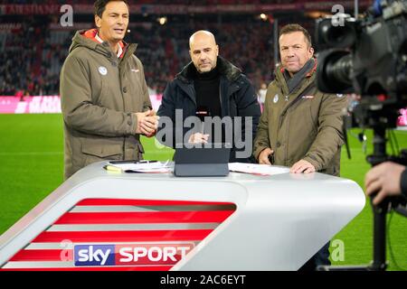 Munich, Germany. 30th Nov 2019. Football FC Bayern Munich - Leverkusen, Munich November 30, 2019. Peter BOSZ, headcoach teammanager Leverkusen  Lothar Matthaeus Sebastian HELLMANN, Sky Moderator  presenter  FC BAYERN MUNICH - BAYER 04 LEVERKUSEN 1-2  - DFL REGULATIONS PROHIBIT ANY USE OF PHOTOGRAPHS as IMAGE SEQUENCES and/or QUASI-VIDEO -  1.German Soccer League , Munich, November 30, 2019  Season 2019/2020, matchday 13, FCB, München © Peter Schatz / Alamy Live News Stock Photo