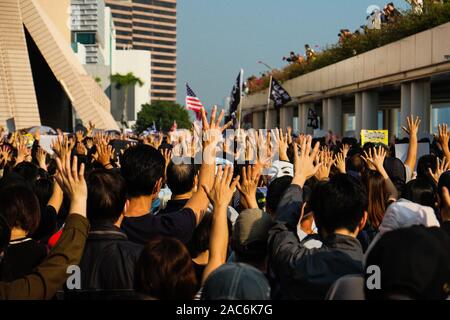 Hong Kong, China. 1st Dec, 2019. Thousands of Pro-democracy protesters take part in a rally from the Tsim Sha Tsui district to Hung Hom in Hong Kong, China. Demonstrations in Hong Kong continued into its sixth month as pro-democracy groups won the District Council elections recently. Protesters continue to call for Hong Kong's government to meet their 5 demands. Credit: Keith Tsuji/ZUMA Wire/Alamy Live News Stock Photo