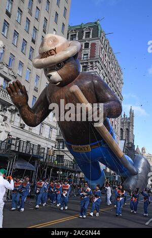 Smokey Bear giant balloon flown low because of high wind during the 93rd Annual Macy's Thanksgiving Day Parade in New York City. Stock Photo