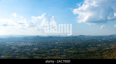 Beautiful sun sky cloud at the mountain range and the city in the background, Photo Loei  city Thailand from Phu Bo Bit mountain peak Stock Photo