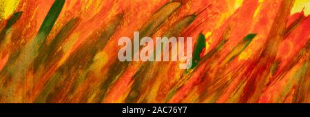 red, orange, yellow, and green watercolor abstract background painted with wide diagonal brush strokes on art canvas (self made), panoramic banner Stock Photo