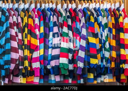 Cambridge University College Rugby Shirts at the Ryder & Amies University Outfitters store in central Cambridge. Ryder and Amies was founded in 1864. Stock Photo