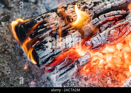 Red hot glowing log fire, hygge feeling Stock Photo