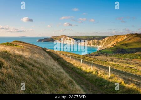 Worbarrow Bay, Dorset, UK. 1st Dec, 2019. UK Weather. A view along the South West Coast Path looking West towards Worbarrow Bay in the Lulworth Army Range in Dorset on a cold sunny day on the first day of winter. The range walks are open to the public most weekends and main school holidays for visitors to explore. Picture Credit: Graham Hunt/Alamy Live News Stock Photo