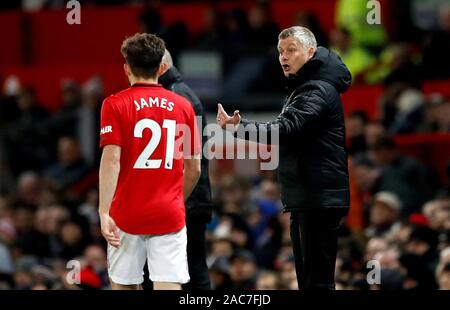 Manchester United manager Ole Gunnar Solskjaer gives instructions to Daniel James (21) during the Premier League match at Old Trafford, Manchester. Stock Photo