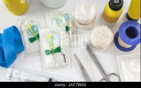 Medical kit for rapid healthcare in nursing due to an emergency or emergency with scissors, syringes, bendas, tape, gauze and other elements Stock Photo