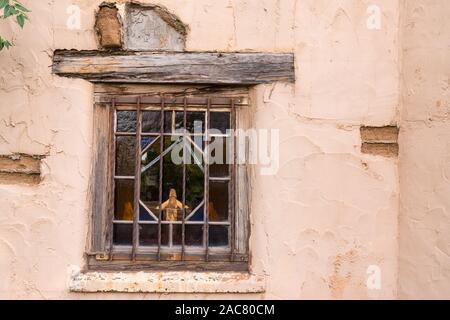 Old Southwestern Brown Adobe Wall and Window Stock Photo