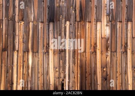 Exterior wall of old weathered wood background Stock Photo