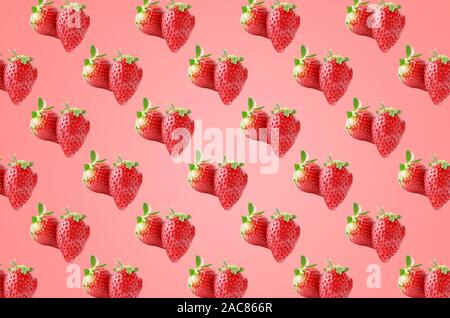 Pattern of strawberry fruits with leaves on the pink surface Stock Photo