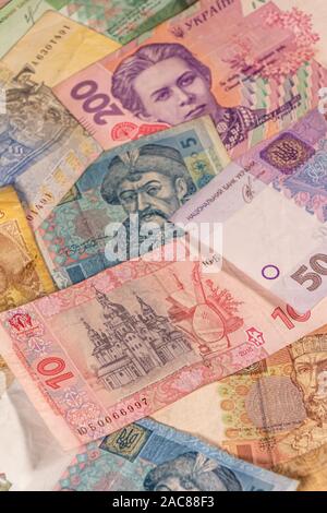 A composition of Ukrainian hryvnia. UAH banknotes providing great options to be used for illustrating subjects as business, banking, media, etc. Stock Photo