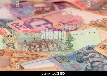 A composition of Ukrainian hryvnia. UAH banknotes providing great options to be used for illustrating subjects as business, banking, media, etc. Stock Photo