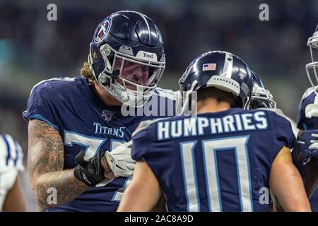 Indianapolis, Indiana, USA. 1st Dec, 2019. Tennessee Titans wide receiver Adam Humphries (10) is congratulated on his touchdown catch and run by Tennessee Titans offensive tackle Taylor Lewan (77) in the first half of the game between the Tennessee Titans and the Indianapolis Colts at Lucas Oil Stadium, Indianapolis, Indiana. Credit: Scott Stuart/ZUMA Wire/Alamy Live News Stock Photo