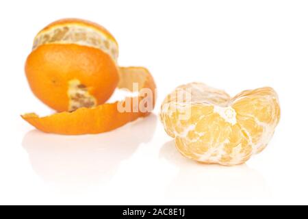 Group of one whole one half of fresh orange mandarin isolated on white background Stock Photo