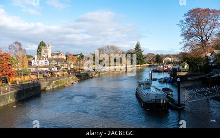 The River Thames at Twickenham, London UK, with Eel Pie Island on the right of the photo, photographed on a bright winter's day. Stock Photo