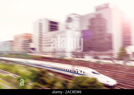 Shinkansen train, The Bullet Train, leaving Shinagawa Station Tokyo Japan Stock Photo