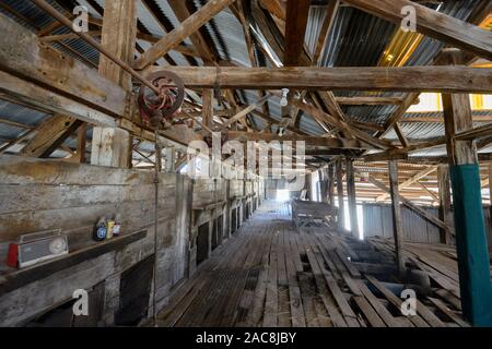 Interior of the historic shearing shed of Dunlop station, near Louth, New South Wales, NSW, Australia Stock Photo