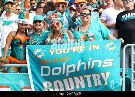 Miami Gardens, Florida, USA. 22nd Dec, 2019. The Miami Dolphins  cheerleaders share the Christmas spirit as they perform during an NFL  football game between the Miami Dolphins and the Cincinnati Bengals at