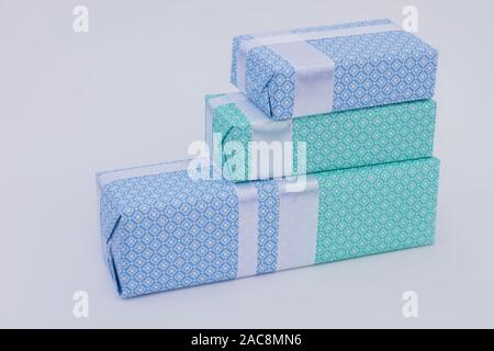 Row of gift boxes on light background. Stock Photo