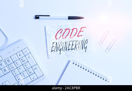 Text sign showing Code Engineering. Business photo showcasing application of engineering to the development of software White pc keyboard with empty n Stock Photo