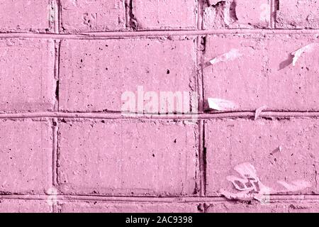 Painted brick wall texture close-up. Abstract background pink color toned Stock Photo