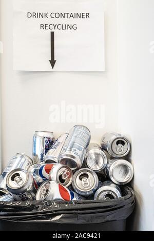 July 14 2019 - Calgary, Alberta , Canada - Soda Can Recycle bin in an office Stock Photo