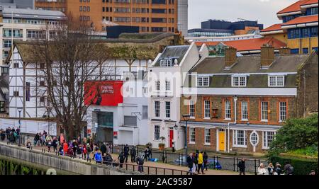 London, England - January 14, 2018: City skyline with the reconstruction of Shakespeare's Globe Theatre on Thames river bank in Bankside Stock Photo