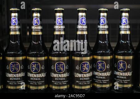 Tyumen, Russia-November 05, 2019: Lowenbrau black beer in bottles, on the shelves of the hypermarket metro cash and carry Stock Photo