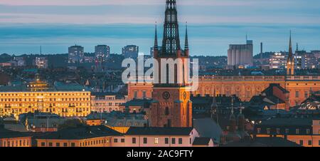 Stockholm, Sweden. Scenic View Of Stockholm Skyline At Summer Evening. Famous Popular Destination Scenic Place In Dusk Lights. Riddarholm Church In Ni Stock Photo