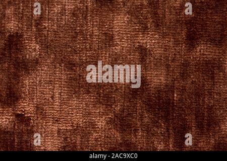 Contrast textile background in velvet brown tone. Stock Photo