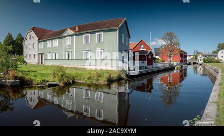 KARLSHAMN, SWEDEN - AUGUST 24, 2019: Houses by the riverside on a summers day Stock Photo