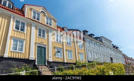 KARLSHAMN, SWEDEN - AUGUST 24, 2019: Some typical wooden townhouses from the Swedish town of Karlshamn. Stock Photo