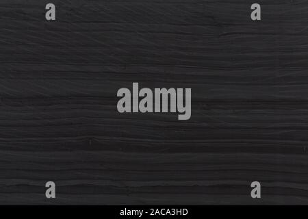 Dark granite. Dark grey black slate background or texture. Stock Photo