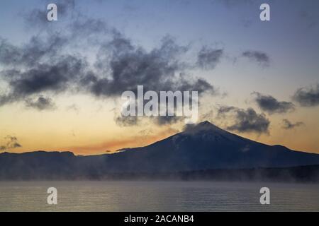 sunrise at Vulcano Villarrica and Lago Villarrica Stock Photo