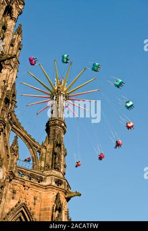 Fair Rides Scotland Walter Scott Monument and high Star Flyer fairground ride. Edinburgh ...