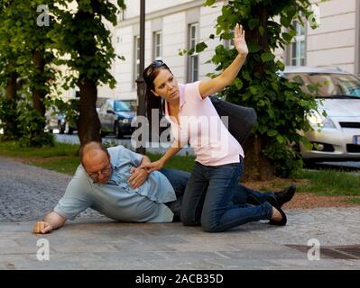 Man has dizzy spell or heart attack Stock Photo