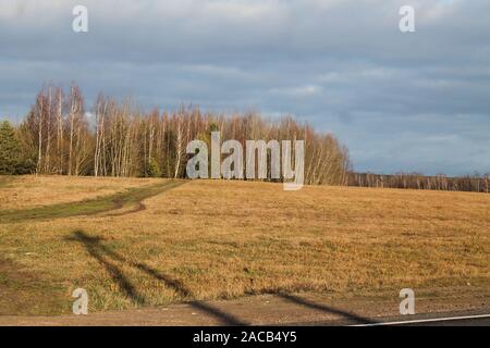 empty landscape road in travel with clouds on the sky  in first winter day Stock Photo