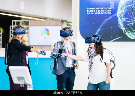 A group of business people wear virtual reality glasses at a congress Stock Photo