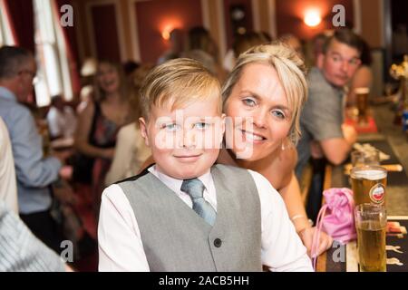 Wedding Guests Smiling Laughing And Having Fun At The