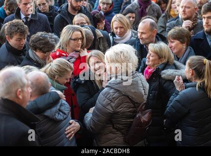 People take part in a vigil at The Guildhall in Cambridge to honour students Saskia Jones and Jack Merritt who were both killed in Friday's London Bridge terror attack. Stock Photo