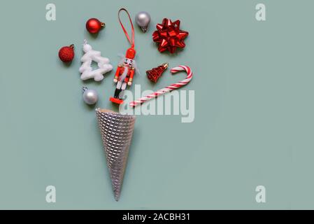 Cristmas minimal concept on pastel grey background. Christmas New Year flat lay. Stock Photo