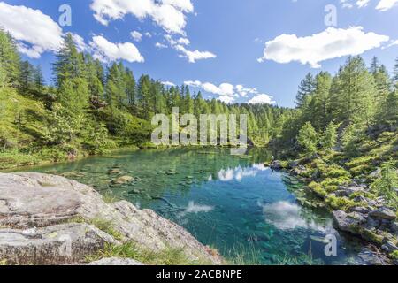 The small lake near Crampiolo known as the Lago delle Streghe, Alpe Devero, Antigorio valley, Piedmont, Italy Stock Photo