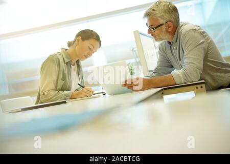 Informal business meeting between work colleagues Stock Photo