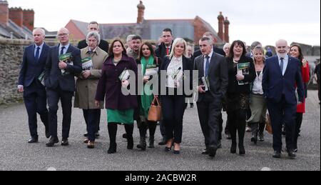 Sinn Fein's Leaders Mary Lou McDonald (centre left) and Michellle O'Neill (centre right) with some of their General Election candidates at the launch of the party's manifesto at the Playhouse Theater in Londonderry. Stock Photo